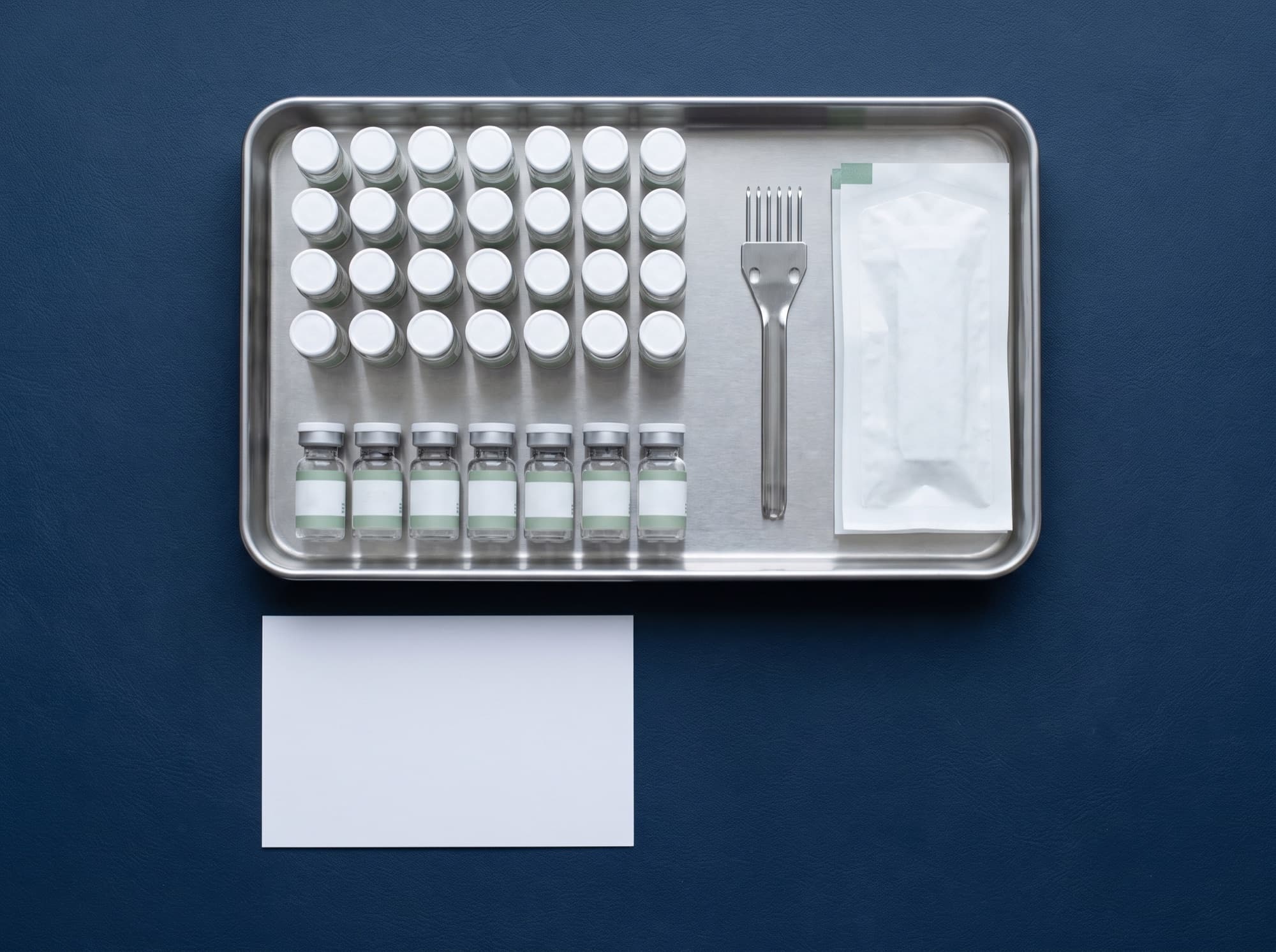 Flat-lay of an in-office allergy testing kit with applicators and labeled test panels, used to guide immunotherapy decisions.